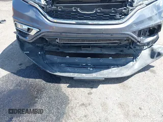 2015 Honda CR-V EX with VIN 3CZRM3H58FG711070, listed as a IAAI auction lot 41948788 with 140,130 mi miles and . Bid and sale history available at carsss.com. Image 6.
