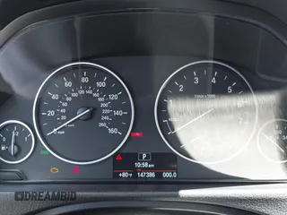 2015 BMW 3 Series 328i with VIN WBA3C1C52FK117753, listed as a IAAI auction lot 42270013 with 147,386 mi miles and . Bid and sale history available at DreamBid. Image 7.