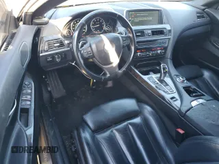 2012 BMW 6 Series 650i z VIN WBALZ3C51CDL72422, wystawiony jako Copart lot #87447914 z przebiegiem 115 376 mil mil oraz Szkody całkowita. Historia ofert i sprzedaży dostępna na DreamBid. Obrazek 8.
