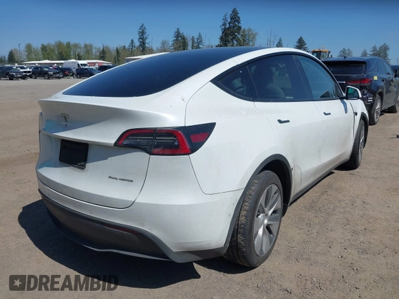 2022 Tesla Model Y Long Range z VIN 7SAYGDEE7NF418223, wystawiony jako IAAI lot #42046651 z przebiegiem 18 724 mil mil oraz . Historia ofert i sprzedaży dostępna na DreamBid. Obrazek 4.