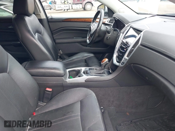 2014 Cadillac SRX Luxury Collection z VIN 3GYFNEE33ES670356, wystawiony jako IAAI lot #42008087 z przebiegiem 59 953 mil mil oraz . Historia ofert i sprzedaży dostępna na DreamBid. Obrazek 5.