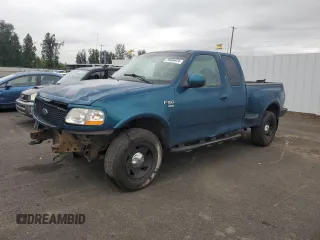 2000 Ford F-150 XL with VIN 2FTRX08LXYCA01517, listed as a Copart auction lot 70600424 with Not provided miles and Salvage title. Bid and sale history available at DreamBid. Image 1.