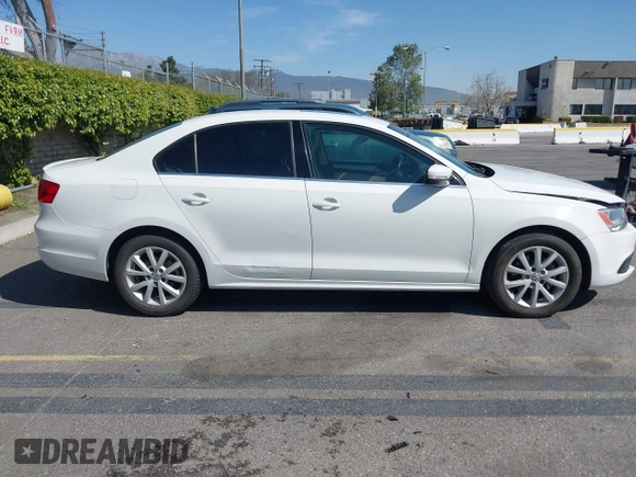 2013 Volkswagen Jetta SE with VIN 3VWDP7AJ9DM253878, listed as a IAAI auction lot 41974451 with 149,720 mi miles and . Bid and sale history available at DreamBid. Image 13.