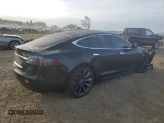 2017 Tesla Model S 100D with VIN 5YJSA1E27HF185487, listed as a Copart auction lot 47979455 with 184,987 mi miles and Salvage Title. Bid and sale history available at DreamBid. Image 3.