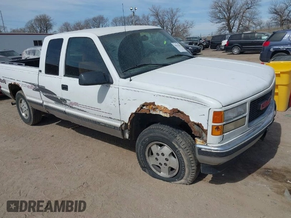 1995 GMC Sierra 1500 z VIN 2GTEK19K0S1580688, wystawiony jako IAAI lot #41811015 z przebiegiem 143 260 mil mil oraz . Historia ofert i sprzedaży dostępna na DreamBid. Obrazek 1.