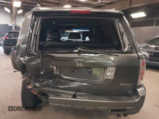 2007 Honda Pilot EX-L z VIN 2HKYF18687H533288, wystawiony jako IAAI lot #42046152 z przebiegiem 165 953 mil mil oraz . Historia ofert i sprzedaży dostępna na DreamBid. Obrazek 16.