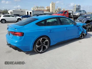 2022 Audi RS 5 Sportback z VIN WUAAWCF57NA901071, wystawiony jako Copart lot #41744493 z przebiegiem 12 409 mil mil oraz . Historia ofert i sprzedaży dostępna na DreamBid. Obrazek 3.
