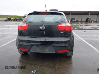 2013 Kia Rio LX with VIN KNADM5A35D6302623, listed as a IAAI auction lot 41626083 with 114,132 mi miles. Bid and sale history available at carsss.com. Image 16.