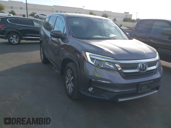 2021 Honda Pilot EX-L with VIN 5FNYF5H54MB018846, listed as a IAAI auction lot 41208987 with 80,757 mi miles and . Bid and sale history available at DreamBid. Image 13.