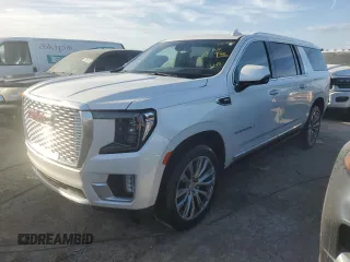 2022 GMC Yukon XL Denali with VIN 1GKS1JKL4NR132740, listed as a Copart auction lot 74690404 with 30,914 mi miles and Non Repairable. Bid and sale history available at DreamBid. Image 1.