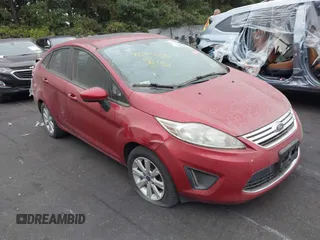 2012 Ford Fiesta SE with VIN 3FADP4BJ1CM145114, listed as a IAAI auction lot 40446295 with 169,529 mi miles. Bid and sale history available at carsss.com. Image 1.