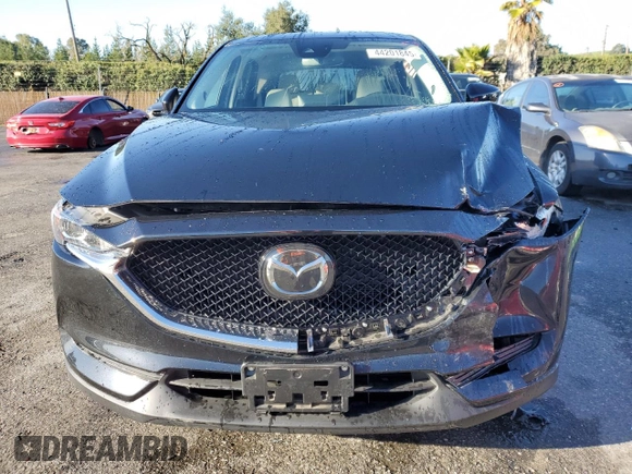 2021 Mazda CX-5 Touring with VIN JM3KFBCM5M1484465, listed as a Copart auction lot 44201845 with 23,777 mi miles and Salvage Title. Bid and sale history available at carsss.com. Image 5.