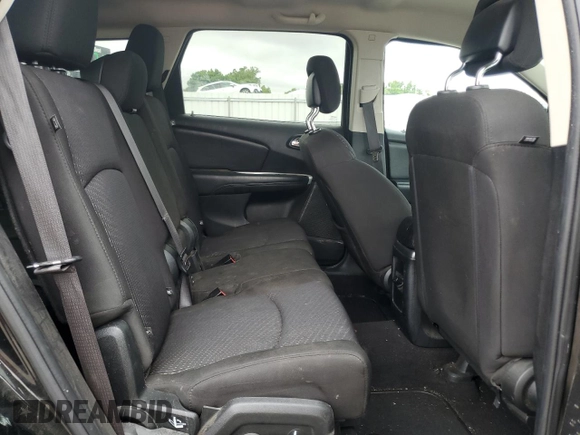 2019 Dodge Journey SE z VIN 3C4PDCBB1KT798081, wystawiony jako Copart lot #58491395 z przebiegiem 102 740 mil mil oraz Szkoda całkowita • Salvage title. Historia ofert i sprzedaży dostępna na DreamBid. Obrazek 11.