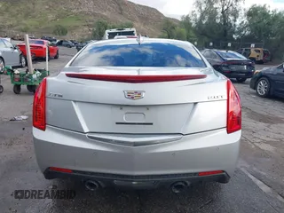 2018 Cadillac ATS Luxury RWD z VIN 1G6AB5RX6J0110860, wystawiony jako IAAI lot #41556662 z przebiegiem 63 886 mil mil oraz . Historia ofert i sprzedaży dostępna na DreamBid. Obrazek 17.