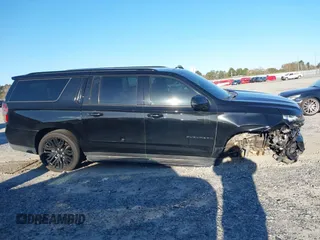 2021 Chevrolet Suburban RST z VIN 1GNSCEKD2MR340613, wystawiony jako IAAI lot #41853016 z przebiegiem 77 498 mil mil oraz . Historia ofert i sprzedaży dostępna na DreamBid. Obrazek 13.