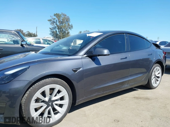 2023 Tesla Model 3 with VIN 5YJ3E1EA7PF673322, listed as a IAAI auction lot 42226767 with 18,367 mi miles and . Bid and sale history available at DreamBid. Image 13.