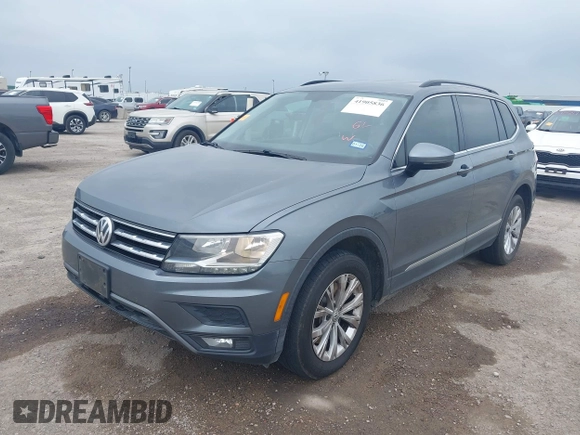 2018 Volkswagen Tiguan SEL with VIN 3VV3B7AX3JM000585, listed as a IAAI auction lot 41905836 with 99,114 mi miles and . Bid and sale history available at DreamBid. Image 2.