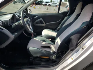 2009 Smart fortwo Passion with VIN WMEEK31X59K232027, listed as a Copart auction lot 55982195 with 63,945 mi miles and Salvage Title. Bid and sale history available at DreamBid. Image 7.