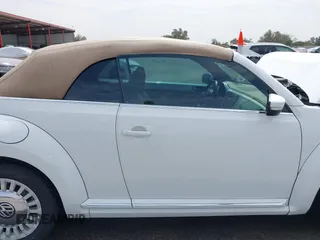 2015 Volkswagen Beetle 1.8T w/Tech with VIN 3VW517AT4FM812294, listed as a IAAI auction lot 41753967 with 59,857 mi miles and . Bid and sale history available at DreamBid. Image 13.