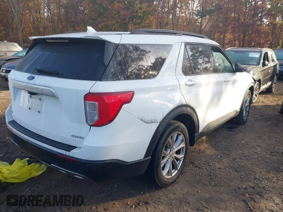2021 Ford Explorer XLT with VIN 1FMSK8DH4MGA10203, listed as a IAAI auction lot 40713164 with 48,285 mi miles. Bid and sale history available at carsss.com. Image 4.