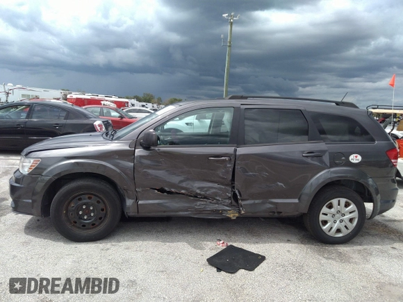 2018 Dodge Journey SE with VIN 3C4PDCAB4JT296083, listed as a IAAI auction lot 41976090 with 63,051 mi miles and . Bid and sale history available at DreamBid. Image 6.