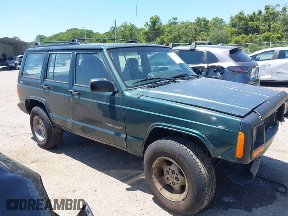 2000 Jeep Cherokee SE with VIN 1J4FF28S0YL236369, listed as a IAAI auction lot 42314386 with 159,005 mi miles and . Bid and sale history available at DreamBid. Image 13.