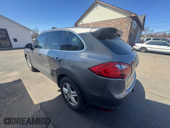 2011 Porsche Cayenne S with VIN WP1AB2A21BLA41795, listed as a Copart auction lot 52769055 with 161,613 mi miles and Clean title. Bid and sale history available at DreamBid. Image 2.
