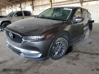 2020 Mazda CX-5 Touring with VIN JM3KFACMXL1852969, listed as a Copart auction lot 53150915 with 97,892 mi miles and Salvage Title. Bid and sale history available at carsss.com. Image 1.