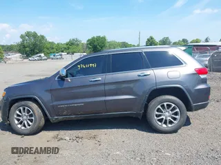 2016 Jeep Grand Cherokee Limited with VIN 1C4RJFBG6GC357385, listed as a IAAI auction lot 42611997 with 148,177 mi miles and . Bid and sale history available at DreamBid. Image 14.