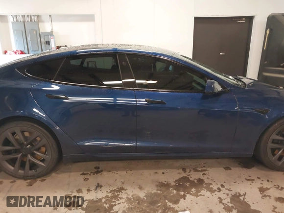 2021 Tesla Model S Plaid with VIN 5YJSA1E6XMF439884, listed as a IAAI auction lot 41622750 with Not provided miles and . Bid and sale history available at DreamBid. Image 13.