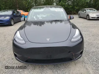 2024 Tesla Model Y Long Range с VIN 7SAYGDEE5RF130383, выставлен на аукционе Copart как лот 60263265 с пробегом 12 531 миль миль и Списание • Salvage title. История ставок и продаж доступна на DreamBid. Изображение 5.