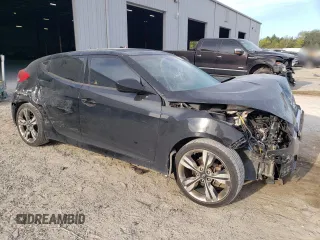 2017 Hyundai Veloster Value Edition with VIN KMHTC6AD5HU321105, listed as a Copart auction lot 50325705 with 100,397 mi miles and Salvage Title. Bid and sale history available at carsss.com. Image 4.