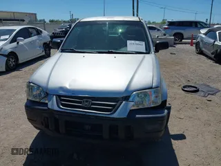 2000 Honda CR-V LX with VIN JHLRD2846YC009880, listed as a IAAI auction lot 41830061 with 263,177 mi miles. Bid and sale history available at carsss.com. Image 6.