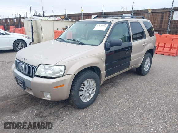2007 Mercury Mariner Luxury with VIN 4M2YU91187KJ14159, listed as a IAAI auction lot 42576802 with 166,027 mi miles and . Bid and sale history available at DreamBid. Image 2.