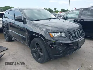 2015 Jeep Grand Cherokee Altitude z VIN 1C4RJFAGXFC659990, wystawiony jako IAAI lot #42331922 z przebiegiem 121 379 mil mil oraz . Historia ofert i sprzedaży dostępna na DreamBid. Obrazek 1.