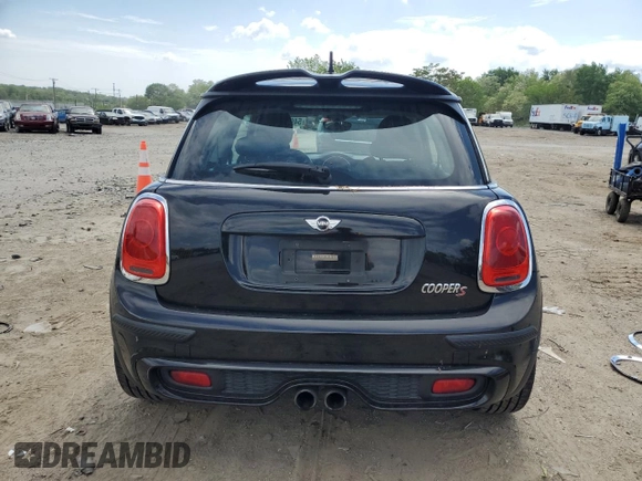 2015 MINI Hardtop S z VIN WMWXP7C50F2A36388, wystawiony jako Copart lot #54910345 z przebiegiem 69 956 mil mil oraz Szkoda całkowita • Salvage title. Historia ofert i sprzedaży dostępna na DreamBid. Obrazek 6.