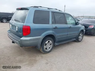 2005 Honda Pilot EX-L with RES with VIN 2HKYF18605H514327, listed as a IAAI auction lot 41563556 with 185,572 mi miles. Bid and sale history available at carsss.com. Image 4.