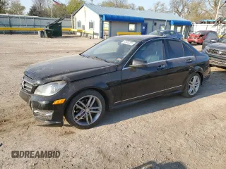 2014 Mercedes-Benz C 250 Sport with VIN WDDGF4HB5ER311927, listed as a Copart auction lot 52055205 with 89,952 mi miles and Salvage title. Bid and sale history available at DreamBid. Image 1.