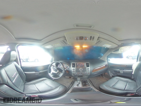2012 Nissan Armada Platinum z VIN 5N1AA0NC4CN613049, wystawiony jako Copart lot #64414564 z przebiegiem 143 009 mil mil oraz Szkoda całkowita • Salvage title. Historia ofert i sprzedaży dostępna na DreamBid. Obrazek 14.
