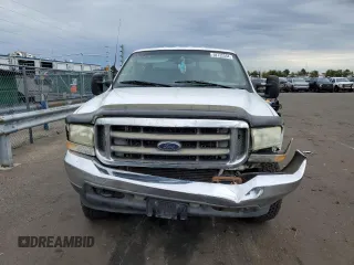 2002 Ford Super Duty F-250 XL with VIN 1FTNW21FX2EB12653, listed as a Copart auction lot 68732594 with 282,115 mi miles and Salvage Title. Bid and sale history available at carsss.com. Image 5.