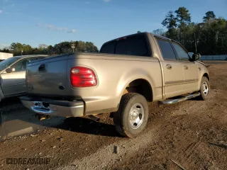 2001 Ford F-150 SuperCrew XLT with VIN 1FTRW07W31KA86300, listed as a Copart auction lot 57283434 with 129,416 mi miles and Salvage Title. Bid and sale history available at carsss.com. Image 3.