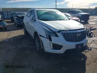 2023 Cadillac XT5 FWD Premium Luxury with VIN 1GYKNCR42PZ128743, listed as a IAAI auction lot 41343939 with 30,115 mi miles and . Bid and sale history available at DreamBid. Image 1.