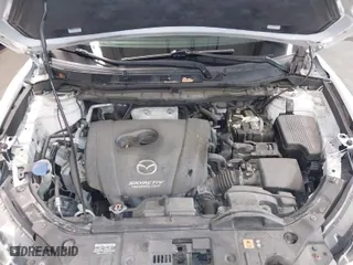 2015 Mazda CX-5 Touring with VIN JM3KE4CY4F0509530, listed as a IAAI auction lot 41858134 with 102,360 mi miles. Bid and sale history available at carsss.com. Image 10.