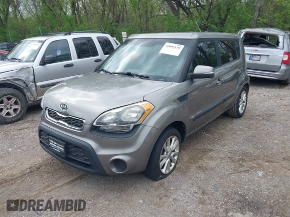 2012 Kia Soul + with VIN KNDJT2A65C7403493, listed as a IAAI auction lot 42095119 with 151,258 mi miles. Bid and sale history available at carsss.com. Image 2.