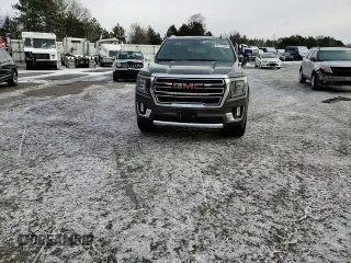 2021 GMC Yukon XL SLT with VIN 1GKS2GKD1MR434218, listed as a Copart auction lot 82777494 with 60,601 mi miles and Salvage Title. Bid and sale history available at carsss.com. Image 12.