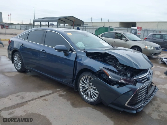 2022 Toyota Avalon Hybrid Limited with VIN 4T1DA1AB2NU013574, listed as a IAAI auction lot 41357973 with 24,475 mi miles. Bid and sale history available at carsss.com. Image 1.