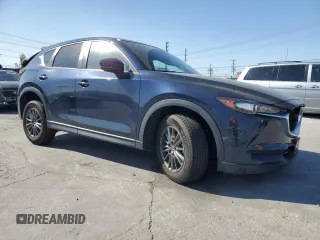 2019 Mazda CX-5 Touring with VIN JM3KFBCM0K0697813, listed as a Copart auction lot 52239505 with 49,844 mi miles and Salvage Title. Bid and sale history available at carsss.com. Image 4.