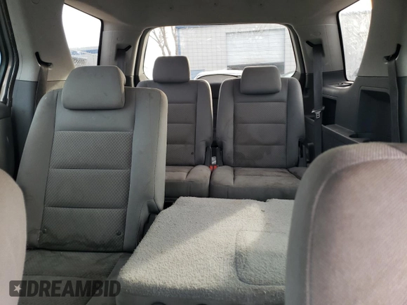 2005 Ford Freestyle SEL z VIN 1FMDK05165GA15433, wystawiony jako Copart lot #87221574 z przebiegiem Nie podano mil oraz Szkoda całkowita • Salvage title. Historia ofert i sprzedaży dostępna na DreamBid. Obrazek 10.