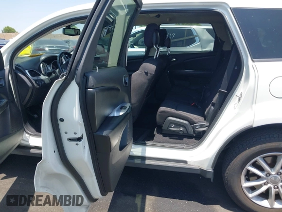 2013 Dodge Journey SXT with VIN 3C4PDCBG4DT696966, listed as a IAAI auction lot 42555632 with 144,927 mi miles and . Bid and sale history available at DreamBid. Image 8.