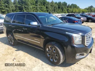 2019 GMC Yukon Denali with VIN 1GKS2CKJXKR206455, listed as a Copart auction lot 73382254 with 146,763 mi miles and Salvage Title. Bid and sale history available at carsss.com. Image 4.